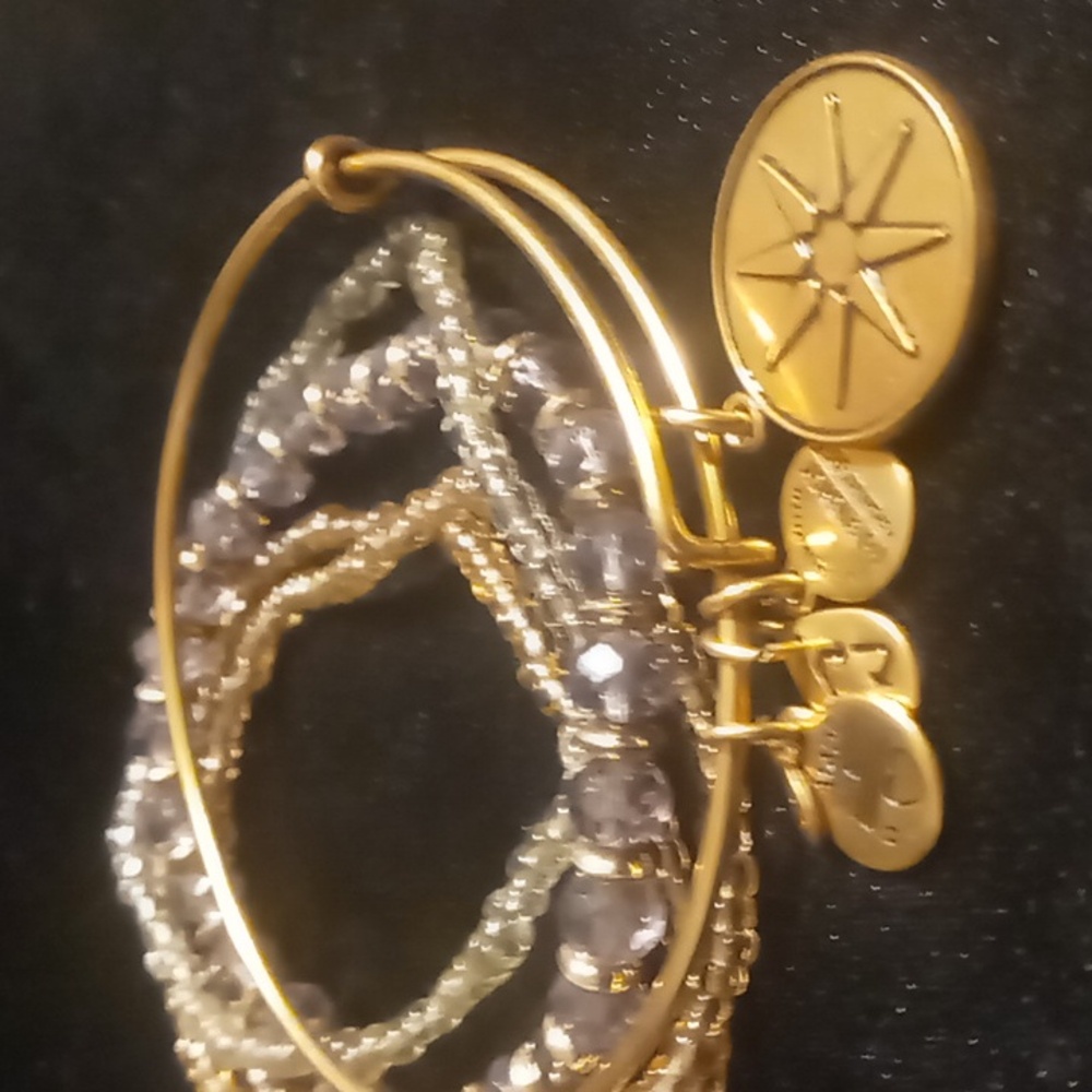 Alex and Ani flower of Venus 2013 gold tone bangle bracelet with lavender glass